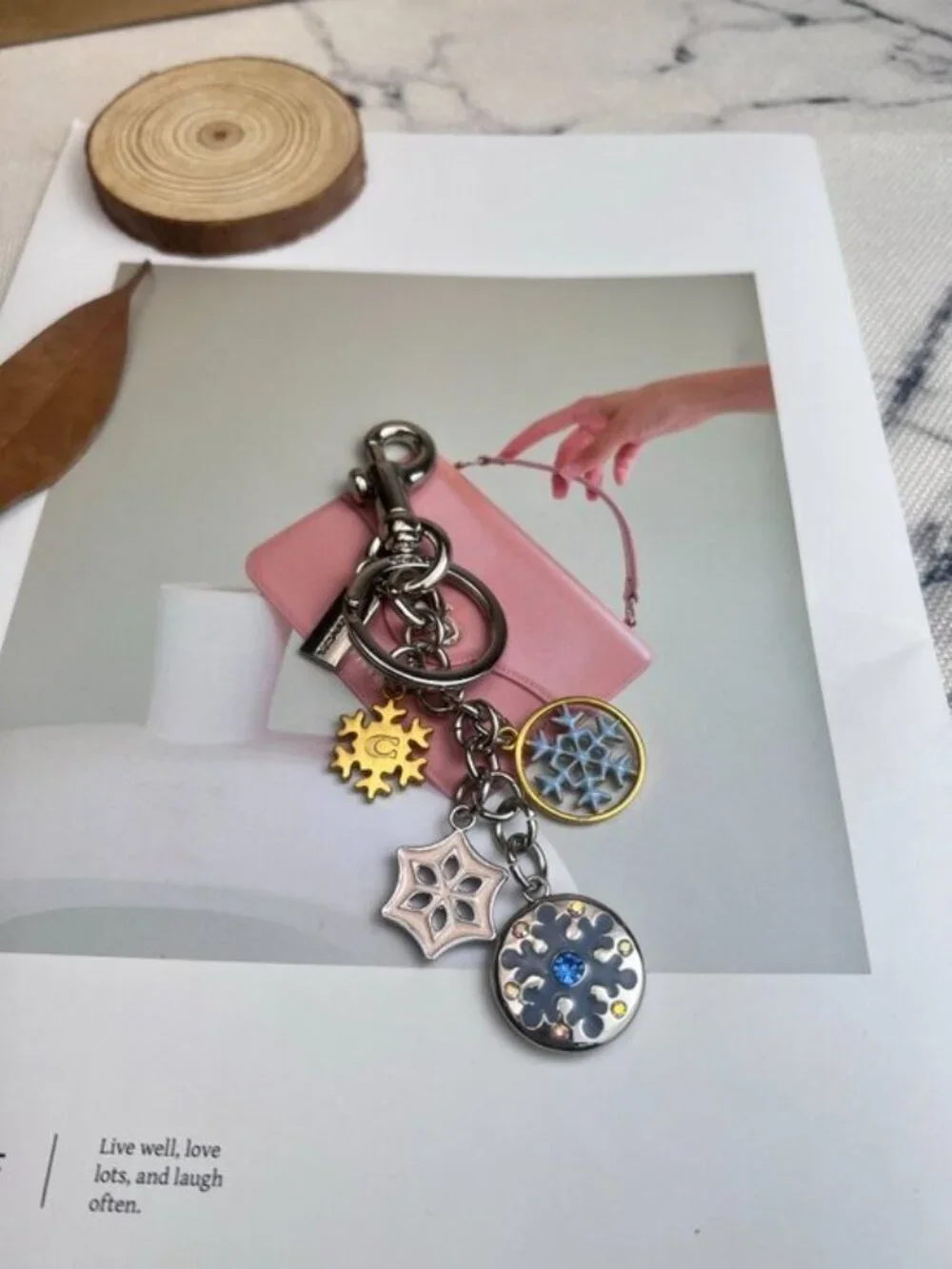 Coach Silver-Tone & Light Blue Snowflake Charm Keychain with Gold Accent